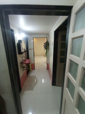 Building Lobby in 2 BHK Apartment at Atharva CHS, Khanda Colony – for Rent