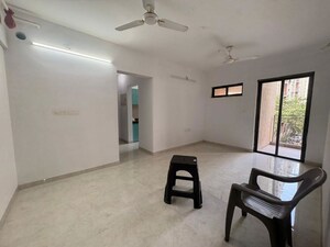 Living Room in 1.5 BHK Apartment at Lodha Lakeshore Greens, Dombivli East – for Rent