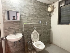 Bathroom in 1.5 BHK Apartment at Lodha Lakeshore Greens, Dombivli East – for Rent
