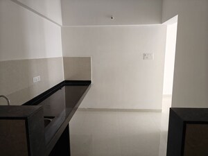 Kitchen in 2 BHK Apartment at Kohinoor Viva City, Dhanori – for Rent