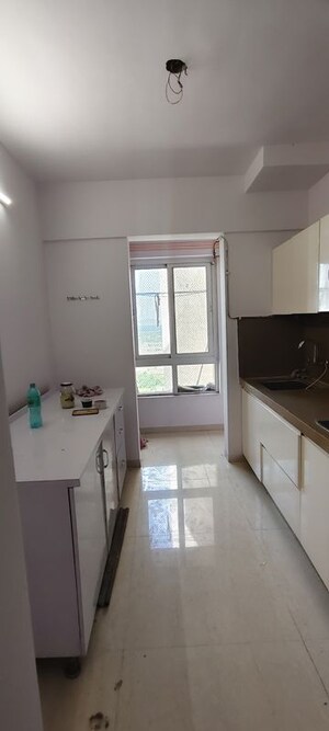 Kitchen in 2.5 BHK Apartment at Puranik Rumah Bali, Ghodbunder Road – for Rent