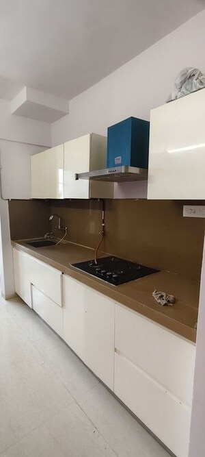Kitchen in 2.5 BHK Apartment at Puranik Rumah Bali, Ghodbunder Road – for Rent