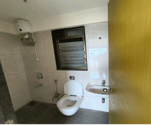 Bathroom in 2 BHK Apartment at Dynamix Shagun Mall Tower, Malad East – for Rent