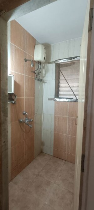 Bathroom in 1 BHK Apartment at Kopar Khairane – for Rent