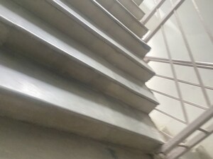 Staircase in 2 BHK Apartment at LandCraft River Heights, Raj Nagar Extension – for Rent