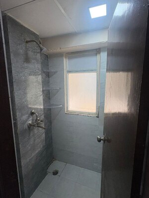 Bathroom in 1 BHK Apartment at Amrapali Dream Valley – for Rent