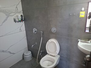 Bathroom in 1 BHK Apartment at Shree Niyati Lake Crown, Mogharpada – for Sale