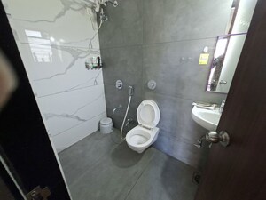 Bathroom in 1 BHK Apartment at Shree Niyati Lake Crown, Mogharpada – for Sale