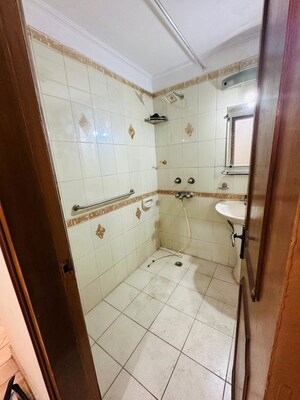 Bathroom in 3 BHK Apartment at Mayur Vihar – for Rent