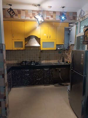 Kitchen in 2 BHK Apartment at Mahagun My Woods, Sector 16c Greater Noida – for Rent