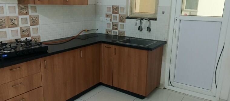 Kitchen, aparna-cyber-life 2 Bedroom 1200 Sq.Ft. Apartment In Nallagandla Hyderabad 10448530