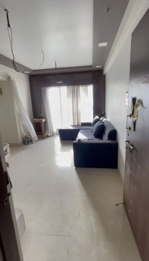 Living Room in 1 BHK Apartment at Vihang Valley Phase 3, Kasarvadavali – for Rent