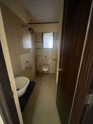 Bathroom in 2 BHK Apartment at Sudarshan Sky Garden, Ghodbunder Road – for Sale