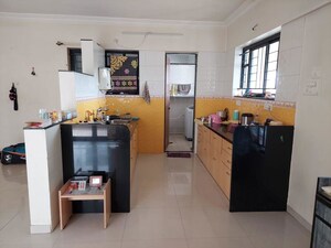 Kitchen in 2 BHK Apartment at Yashoda Heights, Warje – for Rent