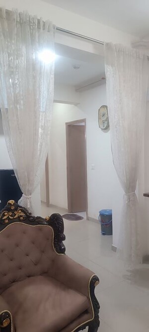 Living Room in 2 BHK Apartment at Pareena Om Apartments, Sector 112 – for Rent