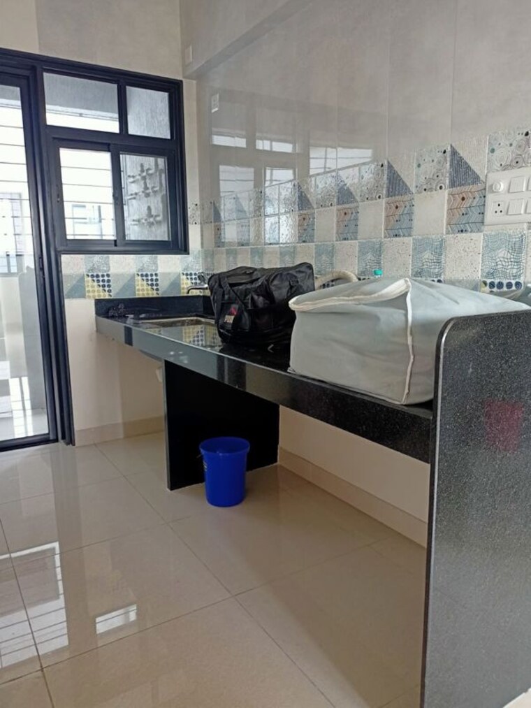 Kitchen, magarpatta-nova 2.5 Bedroom 800 Sq.Ft. Apartment In Mundhwa Pune 10448675