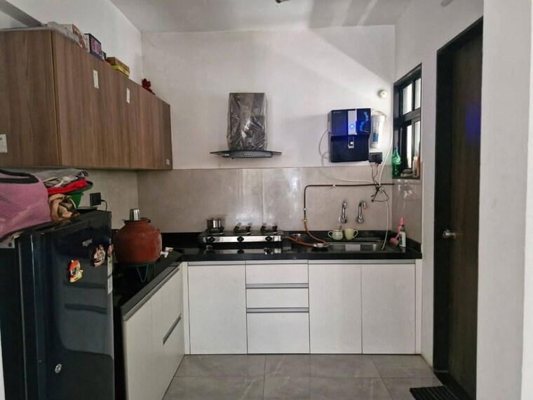 Kitchen, unique-legacy-majestic 2 Bedroom 724 Sq.Ft. Apartment In Mundhwa Pune 10448708