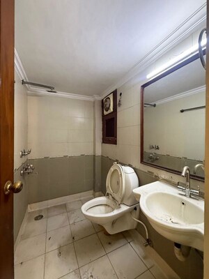 Bathroom in 2 BHK Builder Floor at Kalkaji – for Rent