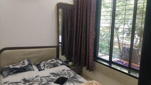 Bedroom in 2 BHK Apartment at Gods Gift CHS Vile Parle West, Vile Parle West – for Rent