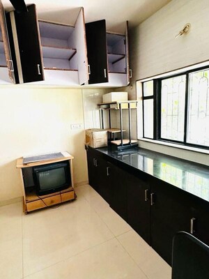 Kitchen in 2 BHK Apartment at Wadgaon Sheri – for Rent