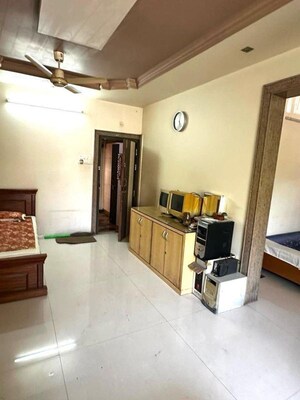 Living Room in 2 BHK Apartment at Wadgaon Sheri – for Rent