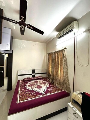 Bedroom in 2 BHK Apartment at Wadgaon Sheri – for Rent