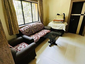 Living Room in 2 BHK Apartment at Wadgaon Sheri – for Rent