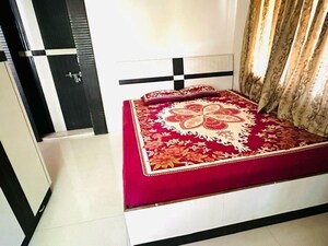 Bedroom in 2 BHK Apartment at Wadgaon Sheri – for Rent