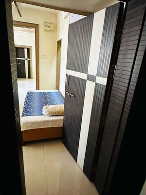 Bedroom in 2 BHK Apartment at Wadgaon Sheri – for Rent