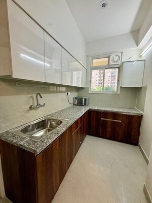 Kitchen in 2 BHK Apartment at Trehan Hill View Garden, Alwar Bypass Road – for Sale