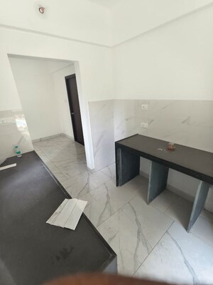 Kitchen in 1 BHK Apartment at Raymond Ten X Habitat, Pokhran Road No Two – for Sale