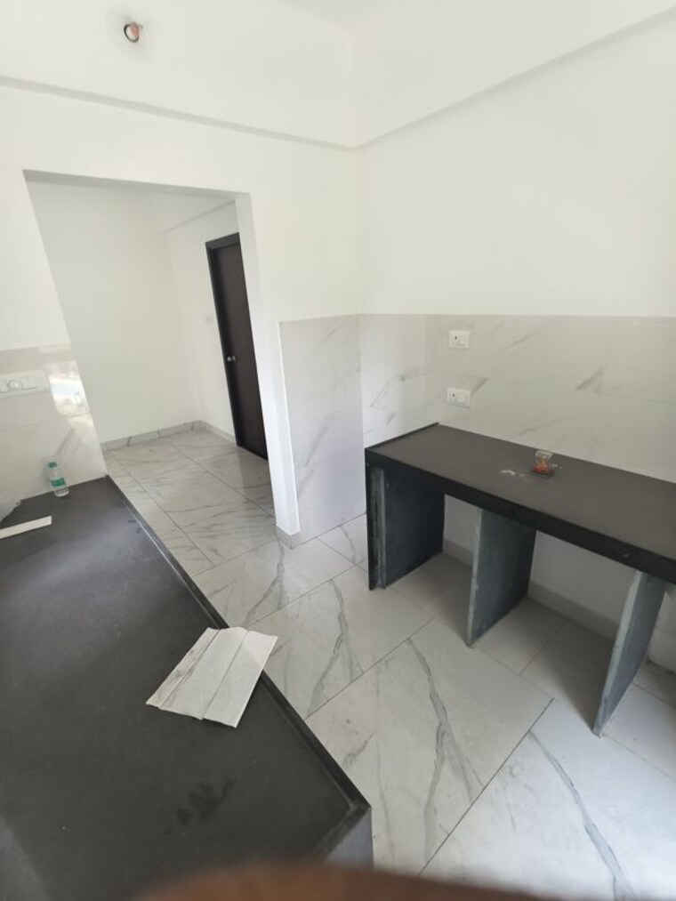 Kitchen, raymond-ten-x-habitat 2 Bedroom 670 Sq.Ft. Apartment In Pokhran Road No Two Thane 10448924