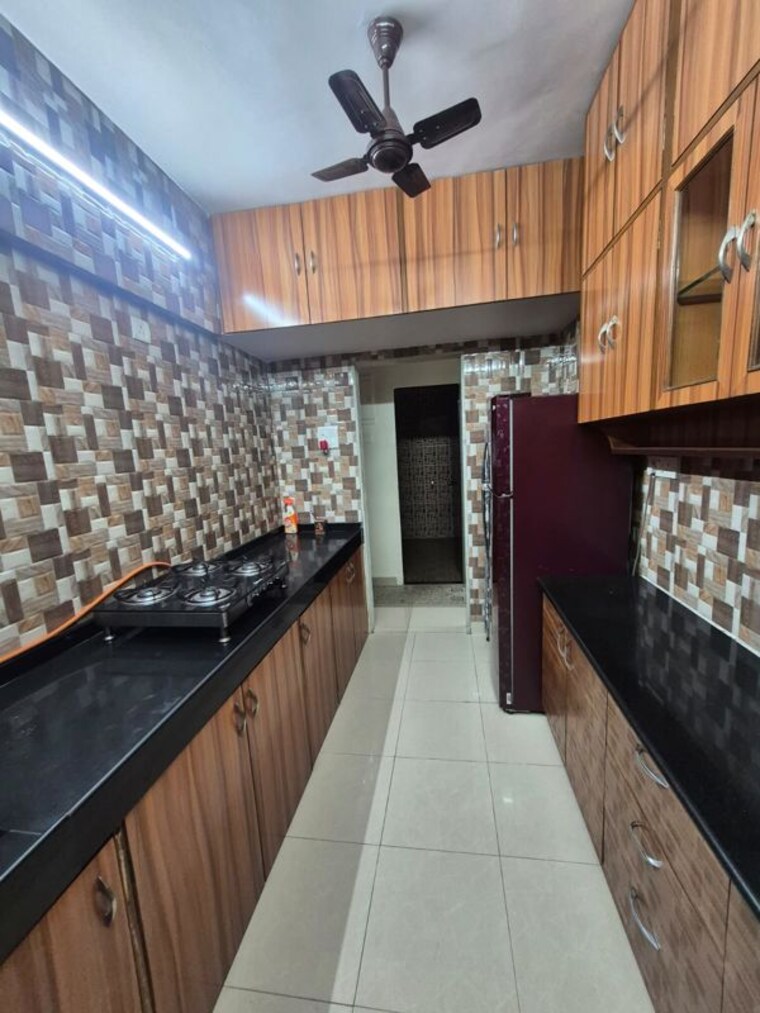 Kitchen, royal-classic-co-op-society 2 Bedroom 950 Sq.Ft. Apartment In Andheri West Mumbai 10448927