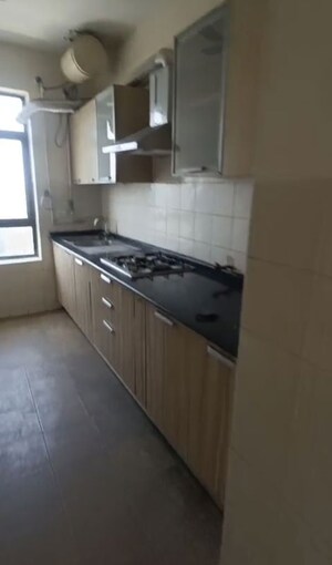 Kitchen in 2 BHK Apartment at Unitech Fresco, Sector 50 – for Rent
