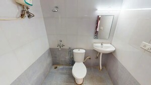 Bathroom in 3 BHK Apartment at Pragna Whistling Woods, Yelahanka New Town – for Sale