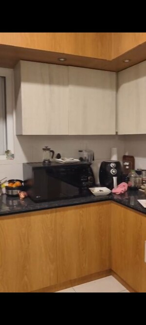 Kitchen in 3 BHK Apartment at Godrej Aqua, International Airport Road – for Rent
