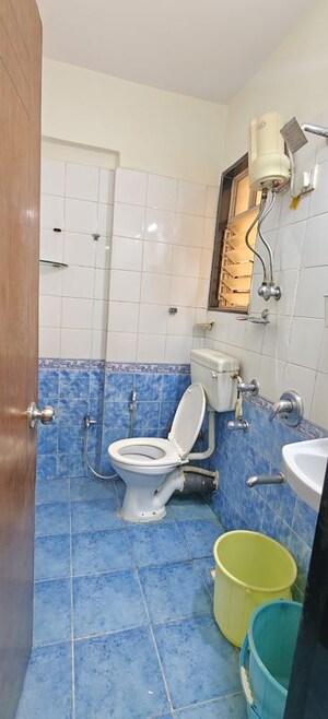 Bathroom in 1 BHK Apartment at Bhoomi Park, Malad West – for Rent