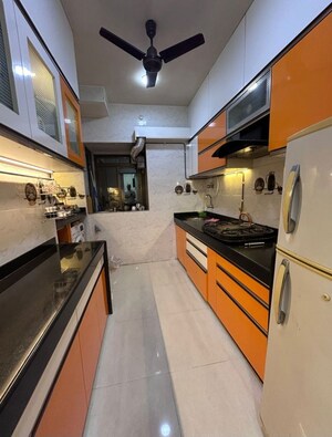 Kitchen in 2 BHK Apartment at Runwal Garden City, Balkum Pada – for Rent