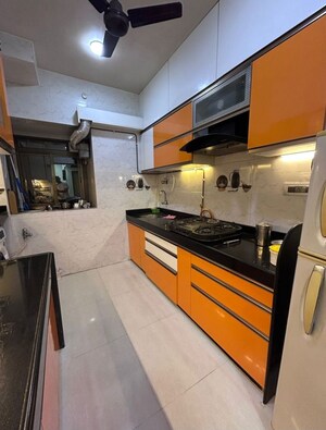 Kitchen in 2 BHK Apartment at Runwal Garden City, Balkum Pada – for Rent