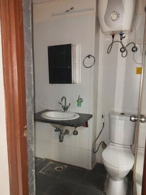 Bathroom in 2.5 BHK Apartment at Antriksh Golf View - II, Sector 78 – for Rent