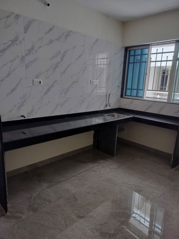 Kitchen, bunty-mayur-kilbil 1 Bedroom 650 Sq.Ft. Apartment In Dhanori Pune 10449116