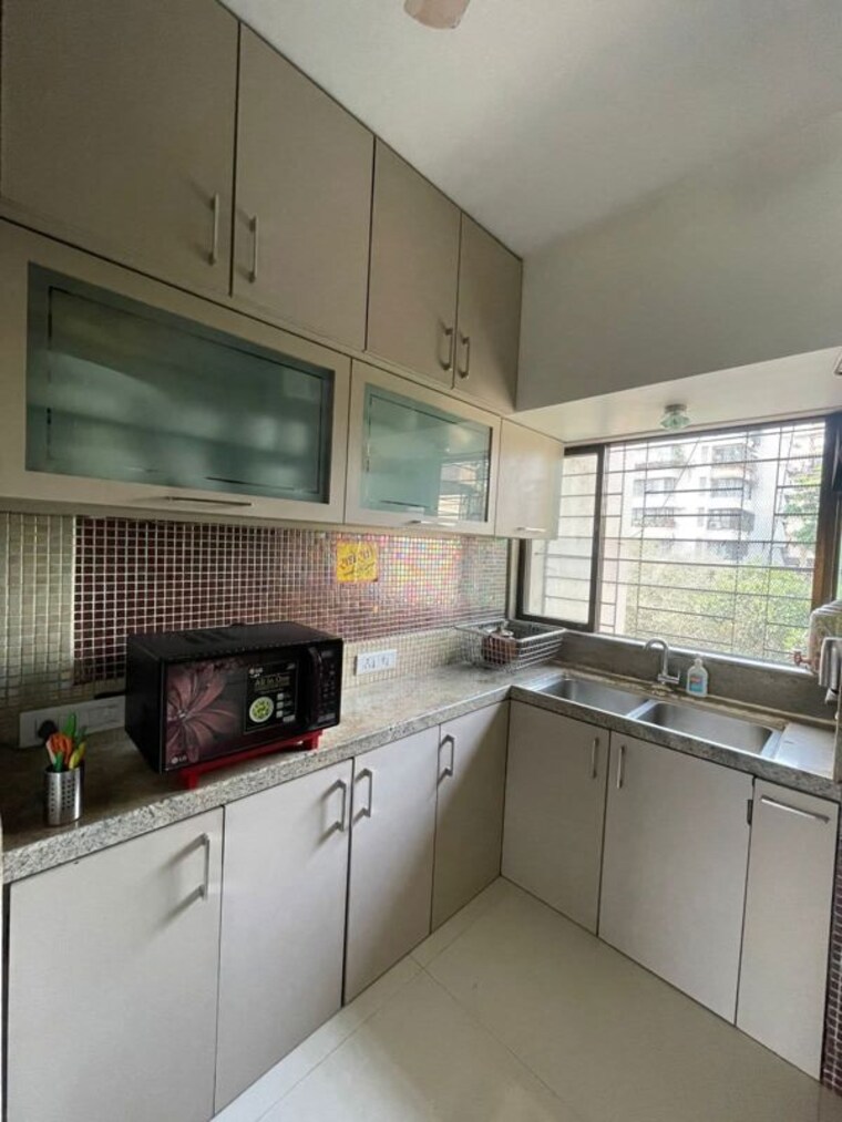 Kitchen, best-complex-andheri-west 3 Bedroom 1200 Sq.Ft. Apartment In Andheri West Mumbai 10449139
