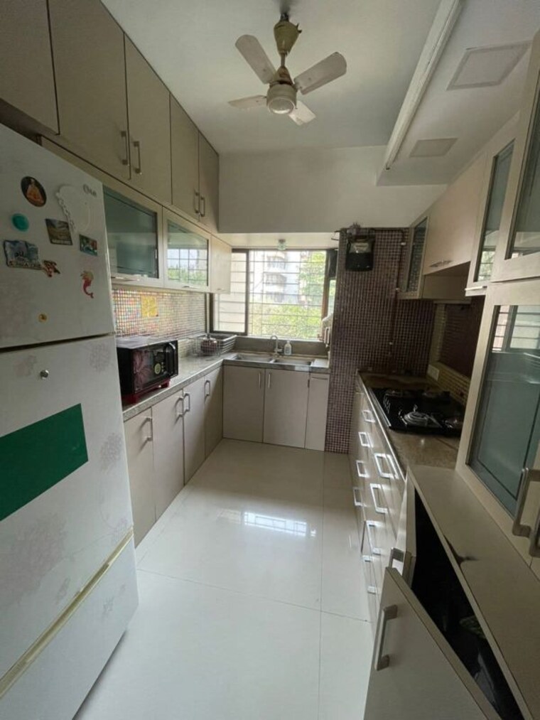 Kitchen, best-complex-andheri-west 3 Bedroom 1200 Sq.Ft. Apartment In Andheri West Mumbai 10449139