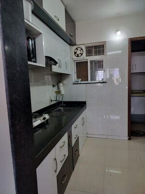 Kitchen in 2 BHK Apartment at Goel Ganga Aria, Dhanori – for Rent