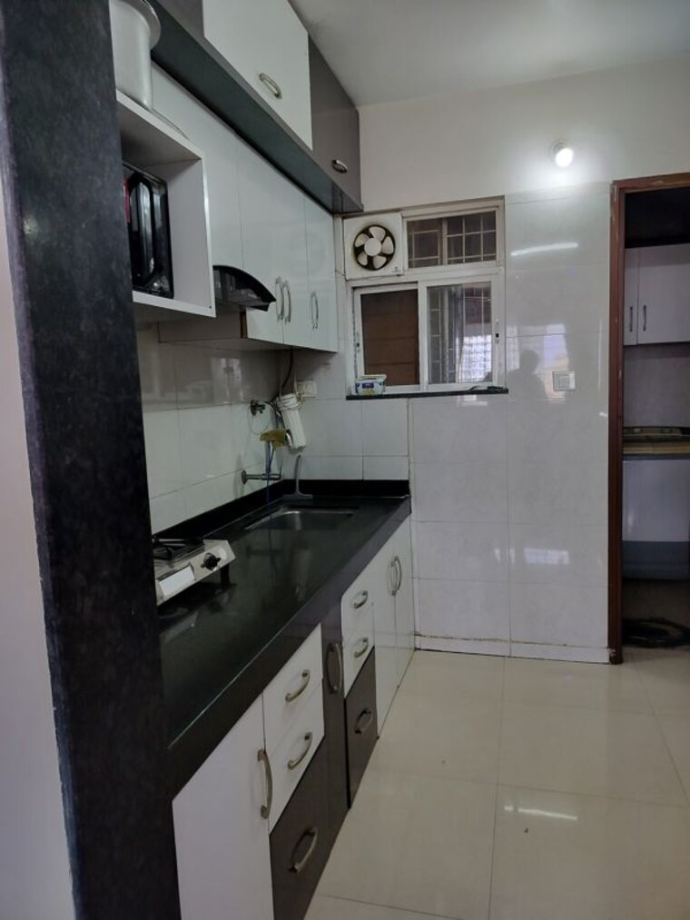 Kitchen, goel-ganga-aria 2 Bedroom 950 Sq.Ft. Apartment In Dhanori Pune 10449145