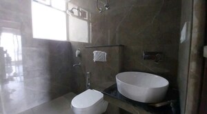 Bathroom in 2 BHK Apartment at Artique Uptown Skylla, International Airport Road – for Rent
