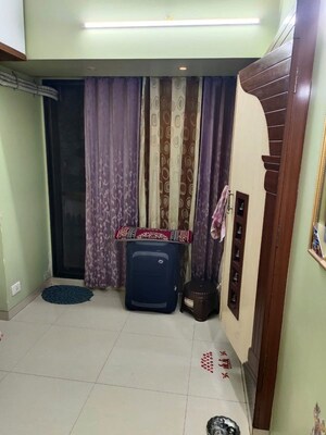 Living Room in 2 BHK Apartment at Hari Niwas CHS, Kamothe – for Sale