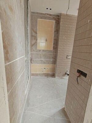 Bathroom in 3 BHK Builder Floor at Pamposh Enclave – for Sale