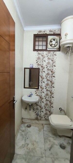 Bathroom in 2 BHK Builder Floor at Mansarover Garden – for Rent