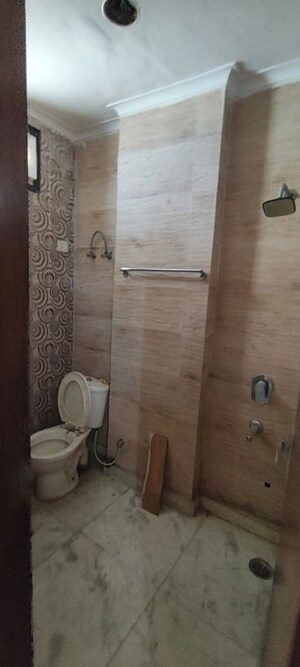 Bathroom in 2 BHK Builder Floor at Mansarover Garden – for Rent